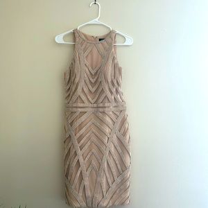 Jovani cocktail dress worn one time. Jeweled and stunning on. Nice fit.